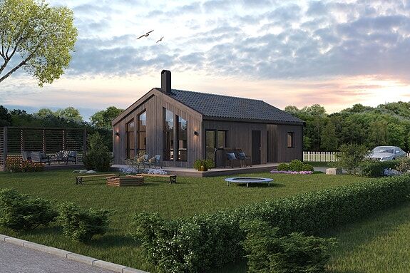 Praktisk og moderne kompaktbolig med åpen himling og vinduer som gir en god romfølelse