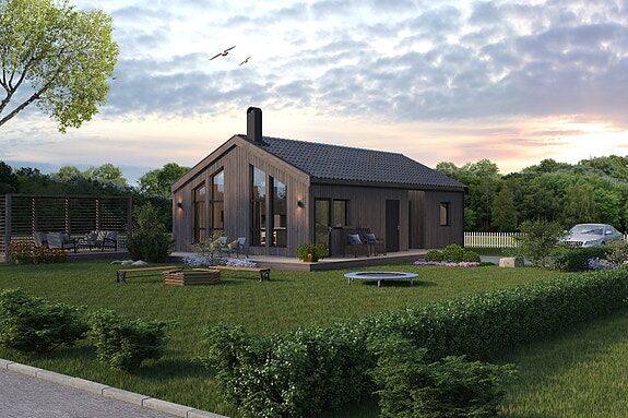 Praktisk og moderne kompaktbolig med åpen himling og vinduer som gir en god romfølelse